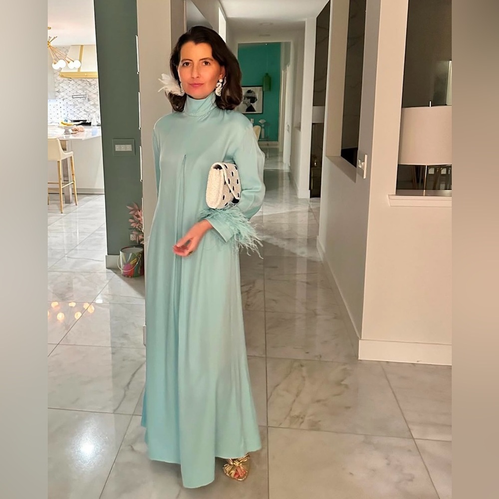 Elegant Aqua Maxi Turtleneck Dress with Feather Cuff